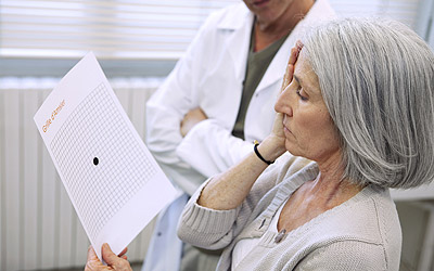 Woman taking an amsler grid test