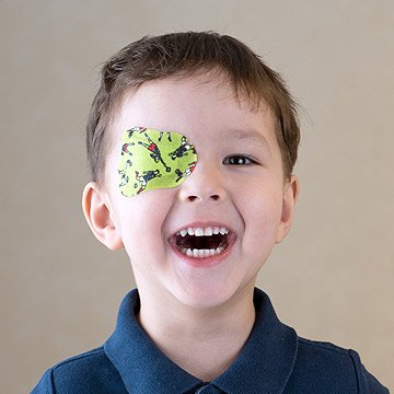 Child with a colorful eyepatch