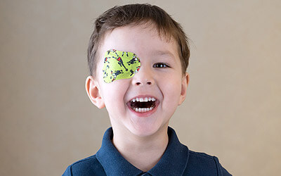 Child with an eye patch